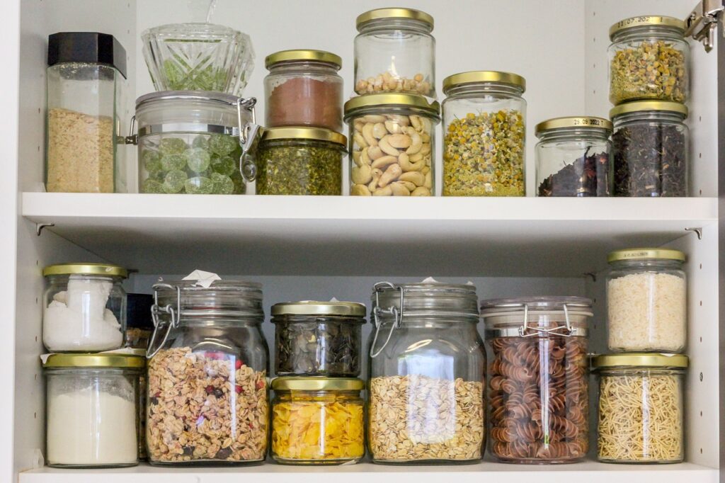 Nutrition Coaching Online - Pantry with glass jars organising your food and diet 